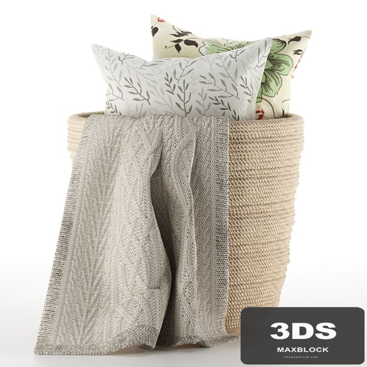 Pillows and plaid in a basket