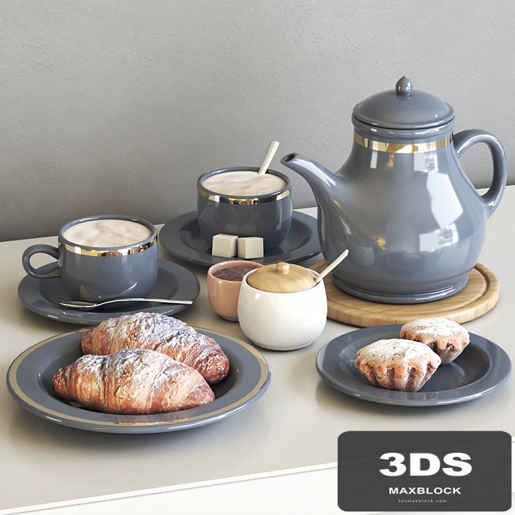 Tea set with croissant and muffin
